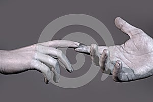 Reaching touching hands. Reach hand. Hopeful concept. Two hands trying to touch. Adam sign. Human relation, togetherness