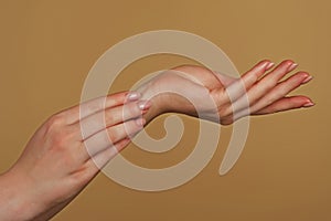 Reaching touching hands. Reach hand. Sensual touch. Beautiful Woman Hands. Female Hands Applying Cream, Lotion. Spa and