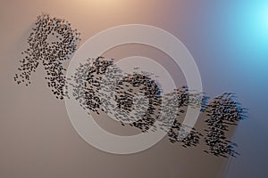 React language. Programming web apps. Word React of the square pixels on a black background