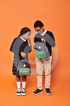 reaction, african american schoolkids in uniform