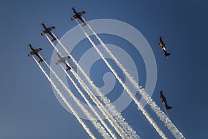 Reactive jet plane flying in formation on blue sky