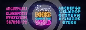 Read Books Change the World neon lettering on brick wall background.neon lettering on brick wall background.