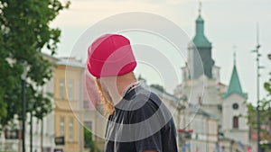 Readhead Hipster in Hat With a Skateboard