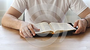 Reading the bible. Prayer. Hands folded in prayer concept. The concept of faith, spirituality and religion