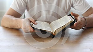 Reading the bible. Prayer. Hands folded in prayer concept. The concept of faith, spirituality and religion