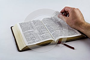 Reading a Bible on White Background