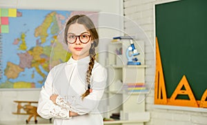 Reading book as hobby. Introducing new units of work. Kid girl wear eyeglasses. Romantic schoolgirl in classroom