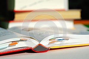 Reading book with bookmarks