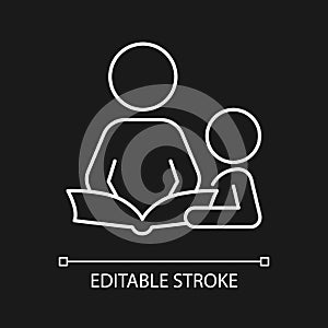 Reading book with child white linear icon for dark theme photo