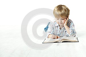 Kid Reading Book, Little Child Boy Read in School, lying down white floor photo