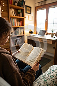 Reading a book on Sunday for study and education photo