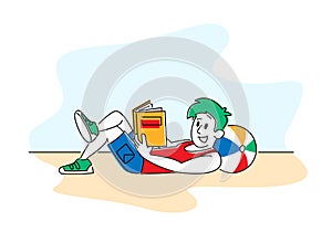 Reading Books Hobby. Young Man Lying on Floor at Home or Beach with Ball under Head Read Interesting Book