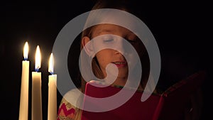 Reading Child by Candles, Prayer Girl in Night, Kid Portrait, Face in Dark 4K