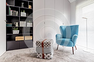 Reading corner with black bookcase