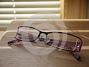 Reading glasses: bedside table - h