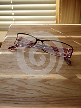 Reading glasses: bedside table - v