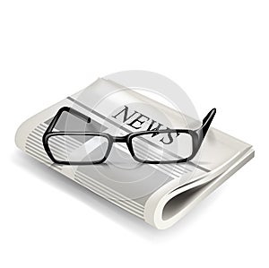 Reading glasses and newspaper
