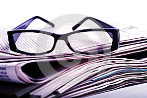 Reading Glasses on Newspapers