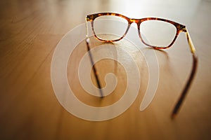 Reading glasses on table