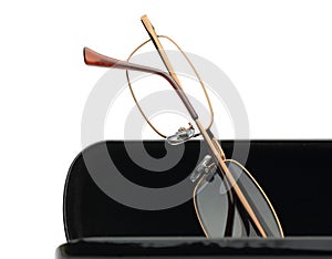 Reading glasses in a white background