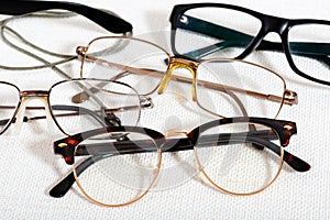 Reading glasses on the white table