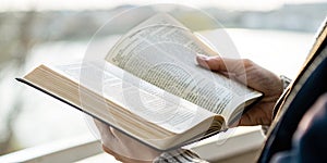 Reading, hand, open book