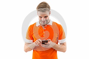 Reading incoming SMS text. Happy man read sms on smartphone isolated on white. Sms messaging. Short message service. SMS