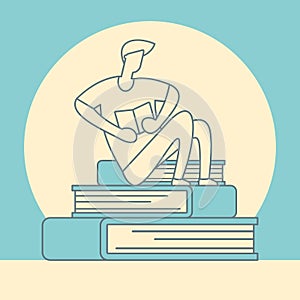 Reading man sits on pile of books