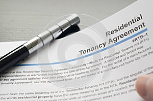 Reading residential tenancy agreement photo