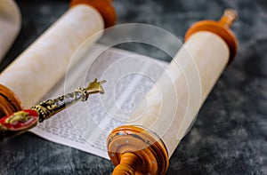 Reading a Torah scroll during a bar mitzvah ceremony .