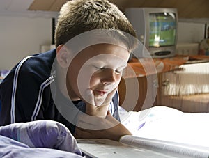 Reading under skylight photo