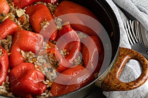 Ready for eat stuffed red peppers with minced meat, rice and vegetables
