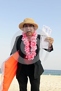 Ready for a holiday: businessman on the beach