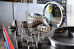 Ready-made bearings in the premises of a factory or workshop. Production of bearings of different sizes.Heavy industry concept.