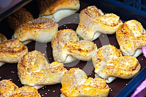 Ready-made biscuits on a baking sheet