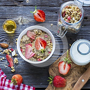 Ready-made granola with dried strawberries and almonds. Healthy breakfast cereal muesli, fresh