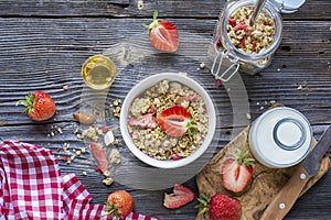 Ready-made granola with dried strawberries and almonds. Healthy breakfast cereal muesli, fresh