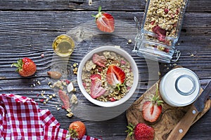 Ready-made granola with dried strawberries and almonds. Healthy breakfast cereal muesli, fresh