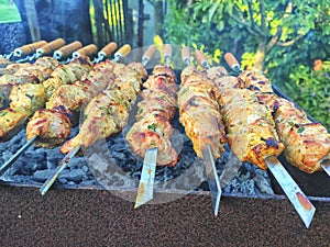 Ready-made grilled kebabs close-up, fried meat. Grilled meat on skewers