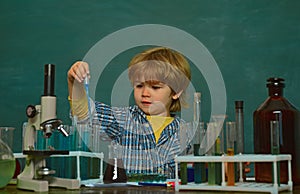Ready for school. Little children at school lesson. schoolboy. Little kids scientist earning chemistry in school lab