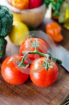 Ready to cook tomatoes and vegetables photo