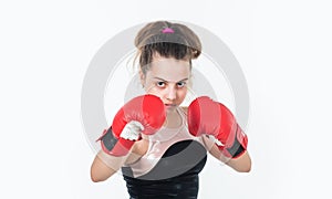 Ready to fight. healthy lifestyle. energetic kids power. child punching in gym. knockout. small girl training in boxing