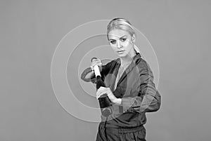 ready to fight. lady girl holding sport equipment or accessory. active wear.