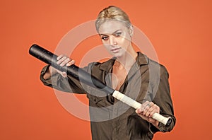 ready to fight. lady girl holding sport equipment or accessory. active wear. rounders game