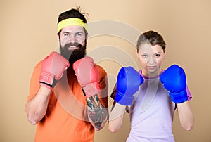 Ready to fight. Man and woman in boxing gloves. Boxing sport concept. Couple girl and hipster practicing boxing. Sport