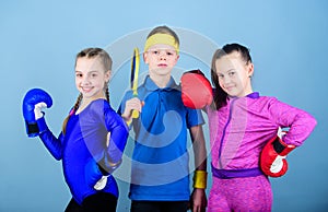 Ready to fight. Team sport success. workout of small girls boxer and boy in sportswear. Happy children in boxing gloves