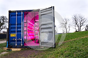 Ready to go shipping container with installed aquaponics, system combines fish aquaculture with hydroponics, cultivating plants in