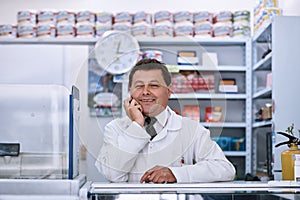 Always ready to help a customer. Portrait of a male pharmacist in a pharmacy.