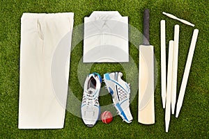 Ready to hit the pitch. High angle shot of cricket gear.