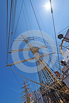 Ready to sail. The mast and rigging of a intricate nautical vessel.